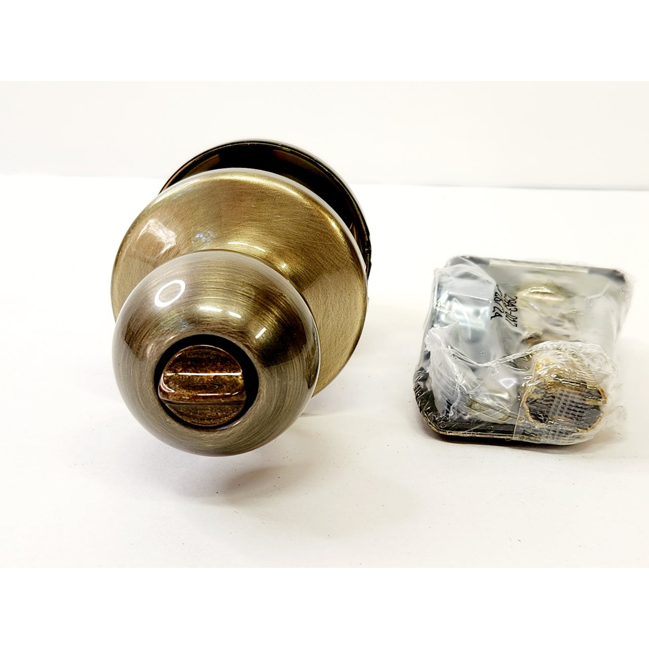 Kwikset 300P 5 6AL RCS Polo Privacy Bed/Bath Door Knob with Lock - Antique Brass